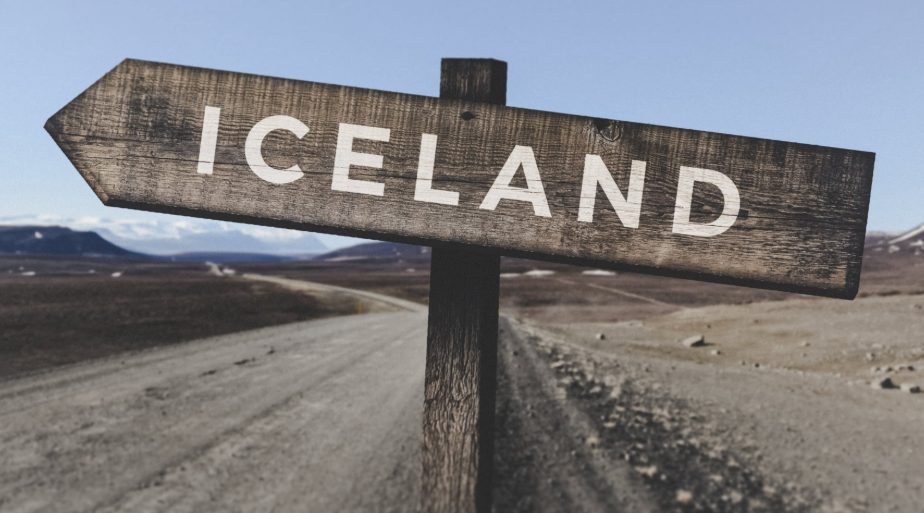 Iceland sign on a rural gravel road. 