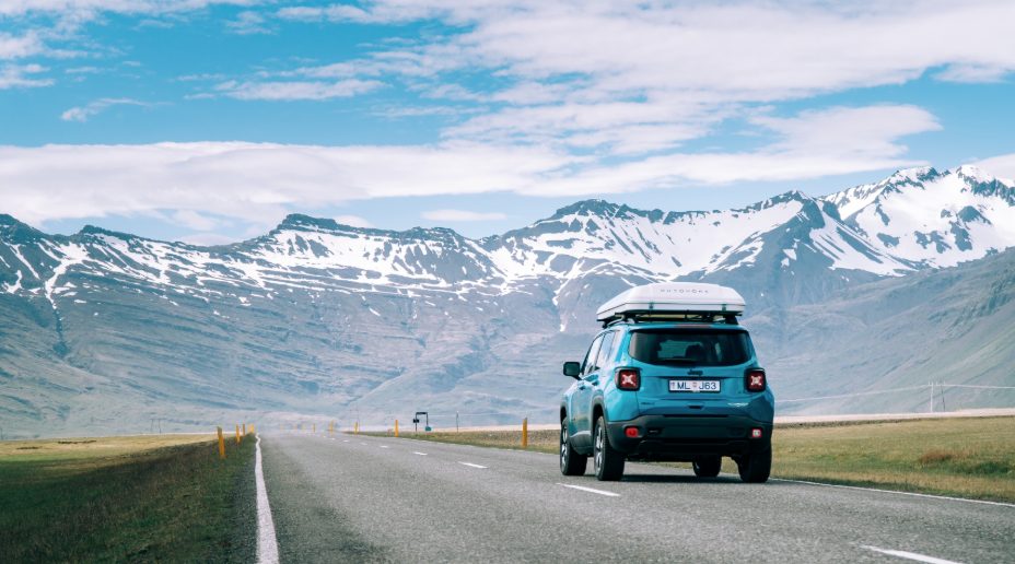 Jeep Renegade 4xe driving on an Icelandic road.