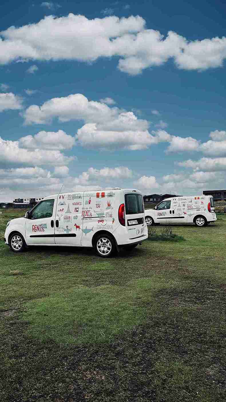 Two Rent.is fiat doblos parked on a campsite