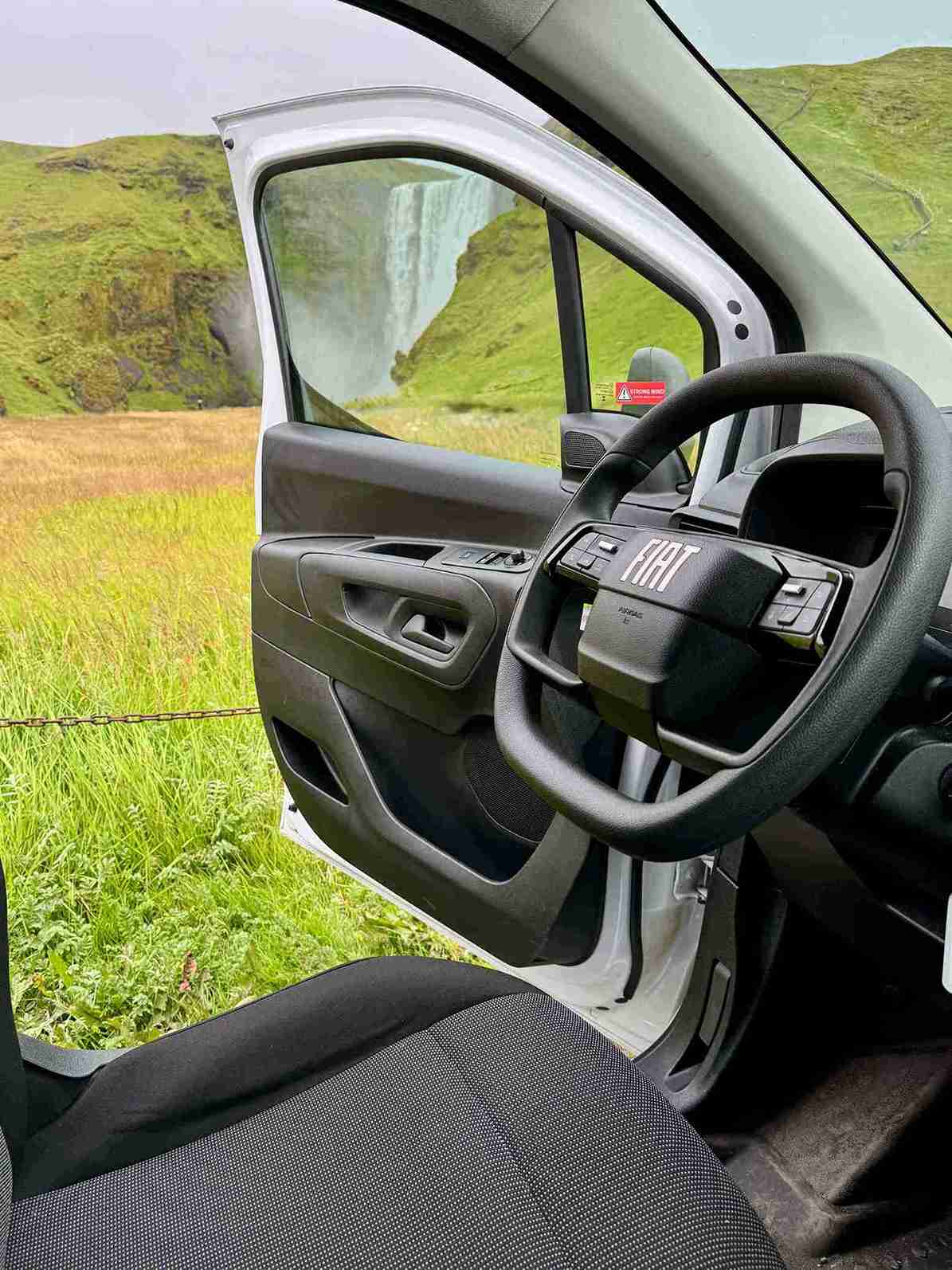 inside the Fiat Doblo with an open door