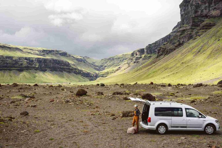VW Caddy parked in a valley and the trunk is open