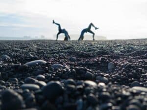 Black sand beach gymnastics