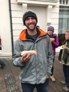 Enjoying a hot dog from Bæjarins Beztu Enjoying a hot dog from Bæjarins Beztu