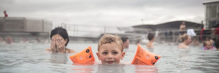 child and mother in the blue lagoon