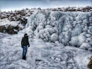 Frozen waterfall in Iceland Frozen waterfall in Iceland