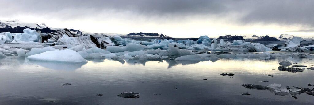 glacier lagoon filled with icebergs