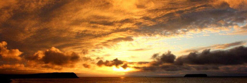 sunset over sea in iceland
