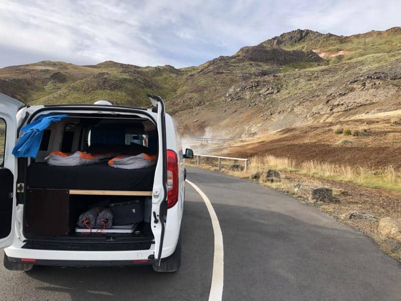 interior of rent.is camper van, sleeping bags, chairs