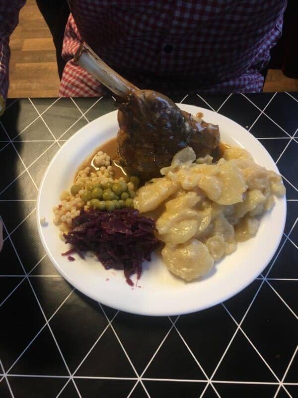 icelandic cuisine lambshank, potatoes, green beans, brown sauce