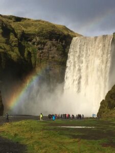 Rainbow above Skógafoss waterfall Rainbow above Skógafoss waterfall