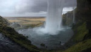 Seljalandsfoss falls from behind Seljalandsfoss falls from behind