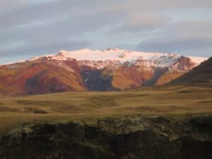 Sun rising above Skógafoss