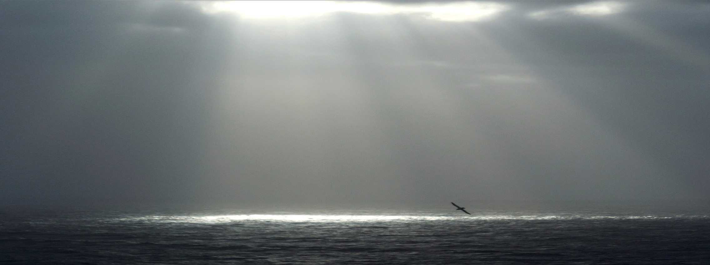 The sun breaking through clouds in Vík in Mýrdal