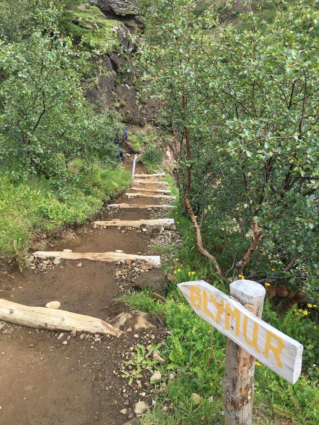 Sign pointing to the walking path to Glymur iceland
