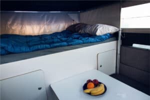 Toyota Hilux 4x4 Camper interior bed sleeping bags pillows