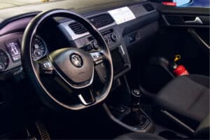 Rent VW Caddy Camper interior dashboard