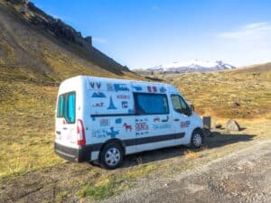 rent renault master 5 campervan parked in nature mountains snow