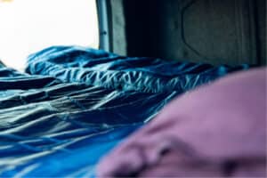 Rent renault kangoo camper interior sleeping area