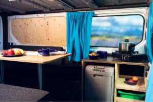 Rent Renault Trafic Auto interior table, fridge, pots, griddle