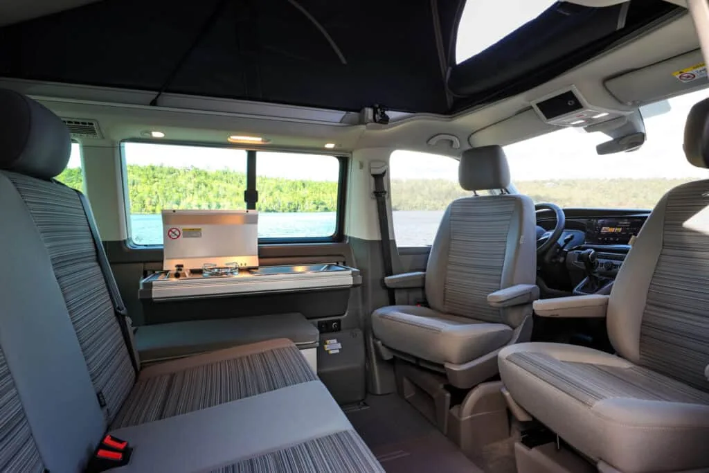 Rent California Beach 4WD camper van interior seats stove