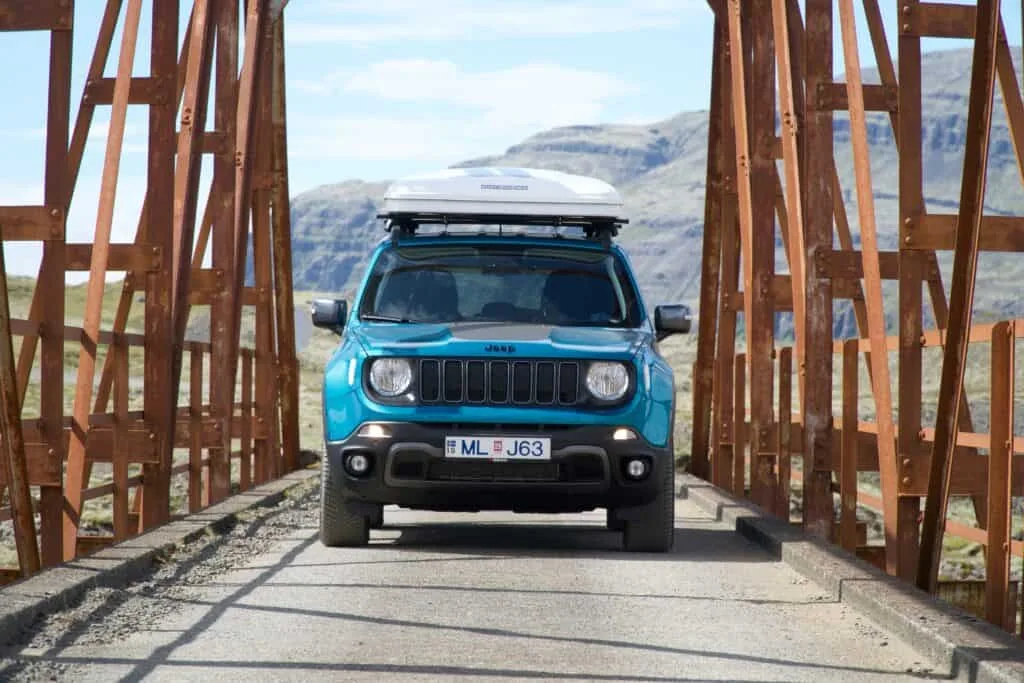 rent.is camper van jeep renagade with roof top tent on bridge Iceland