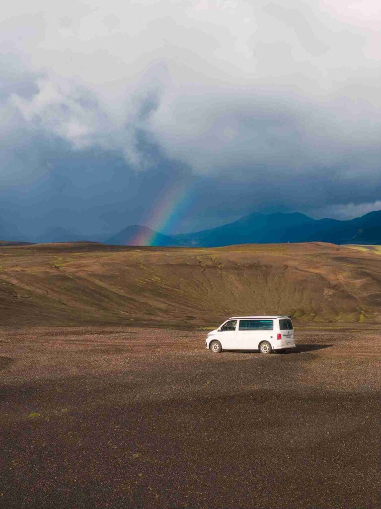 VW California 2024 by a rainbow