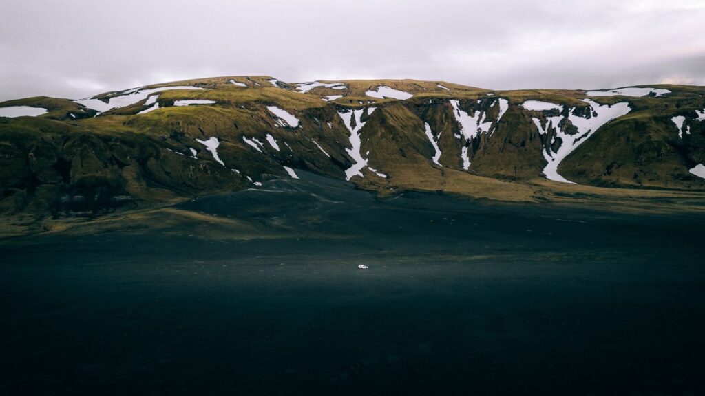 Toyota Hilux 4x4 driving in the Landmannalaugar region of the Icelandic Highlands.
