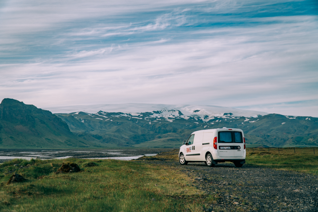 Renault camper van overlooking the Icelandic wilderness.
