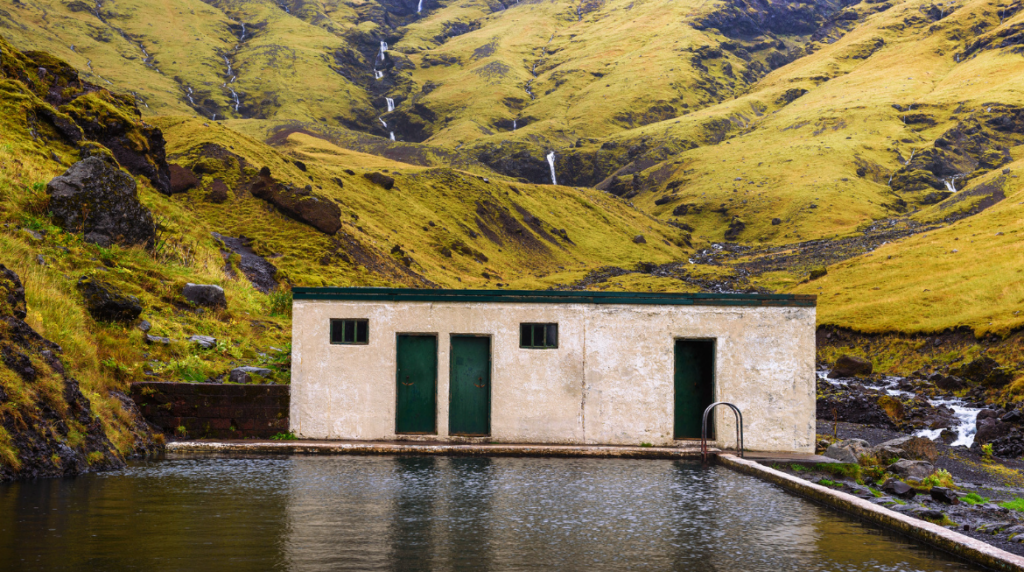 Geothermal Swimming Pool Seljavallalaug in South Iceland.