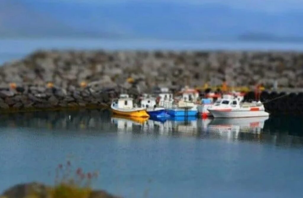 Fishing boats on the water at Arnarstapi Harbor, a popular Snæfellsnes stop
