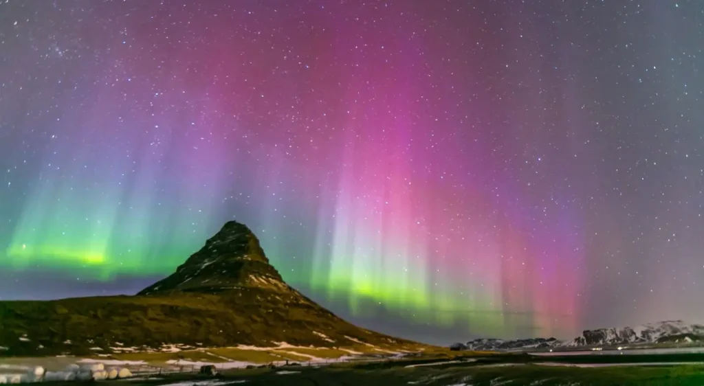 Northern Lights over Kirkjufell Mountain in Iceland.