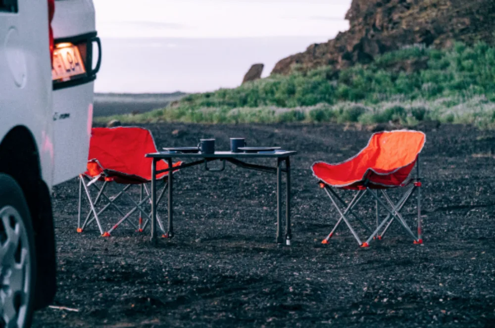 Image of an outdoor dining setup included by some Icelandic camper van rental companies.