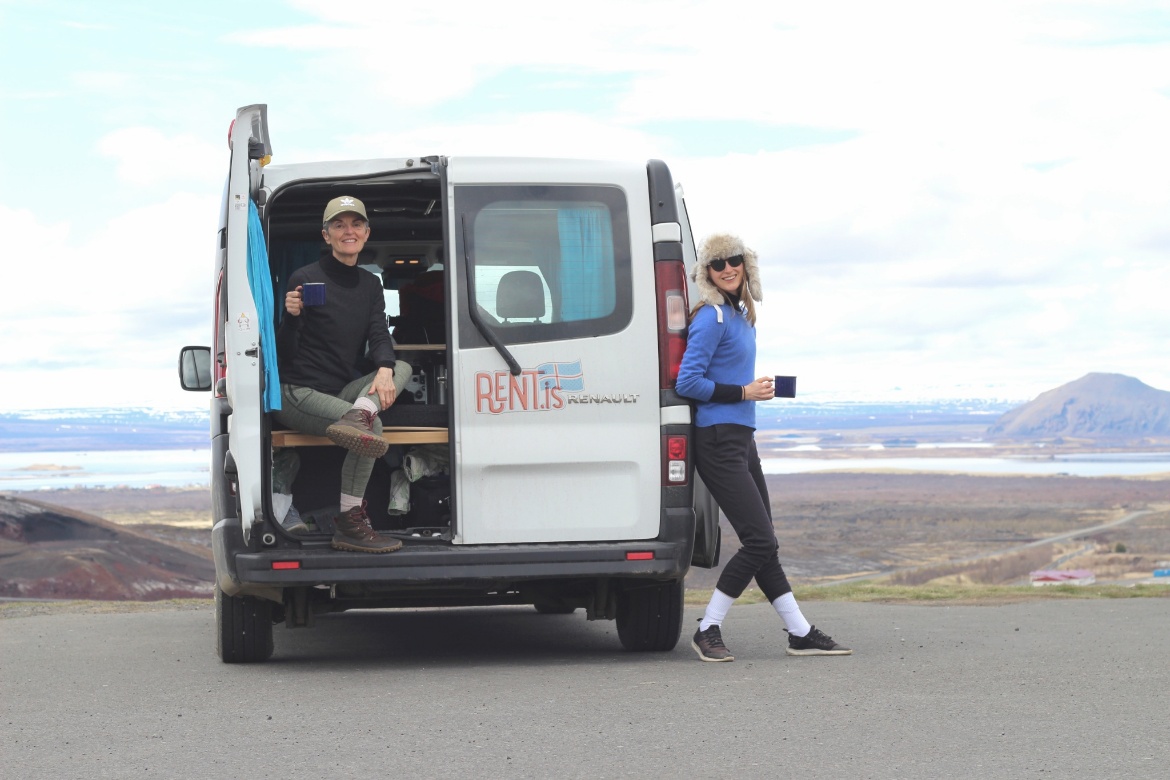 Vanlife, mother and daughter pose by trafic 3