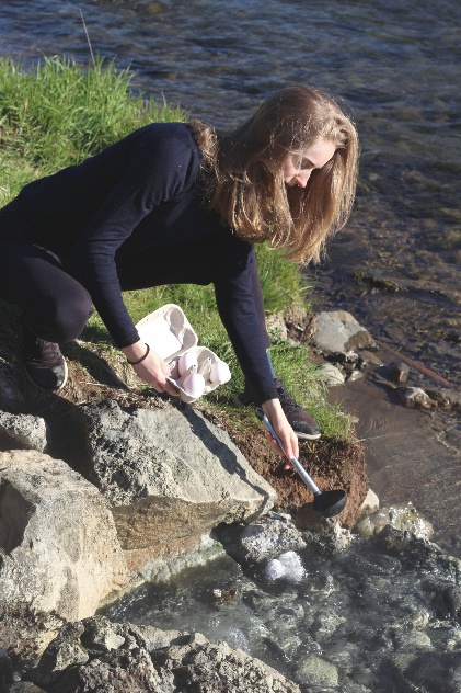 gathering water to cook, from a waterfall