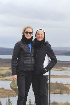 Mother and daughter pose for a photo