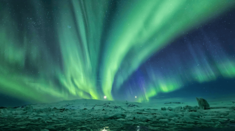Northern Lights over ice in Iceland.
