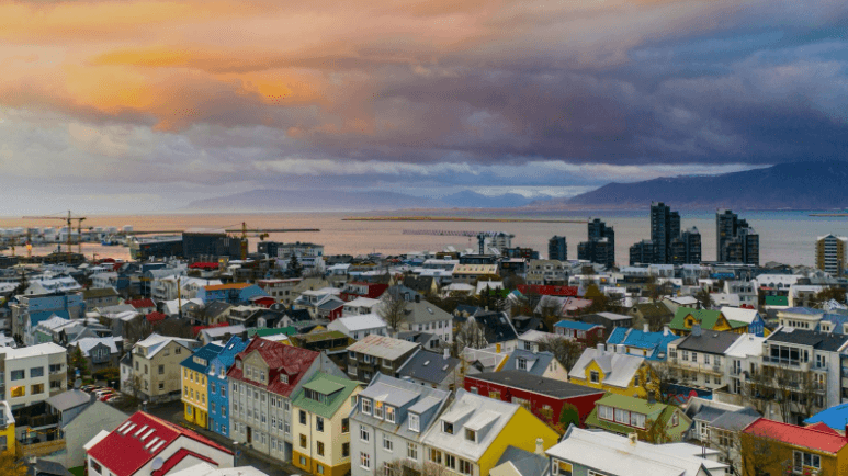 Aerial view of Reykjavik as a storm rolls in from the sea.