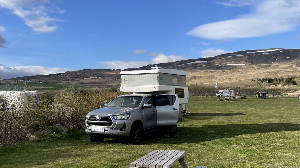 Camper parked at a campsite