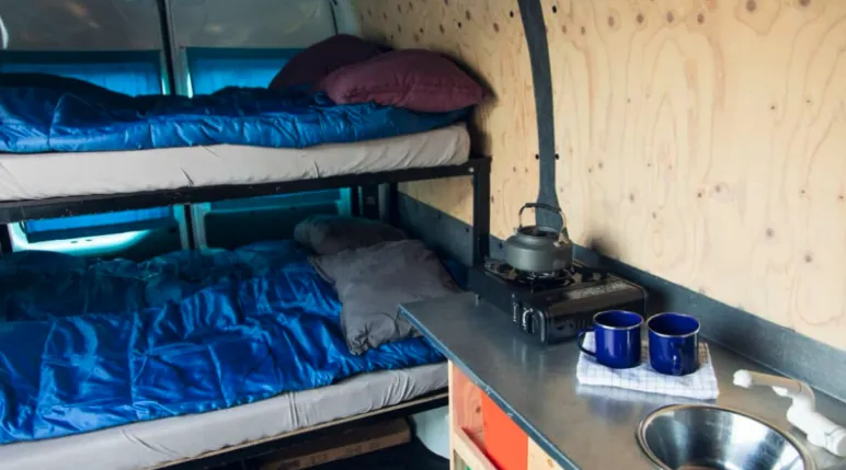 Sleeping area inside a camper van