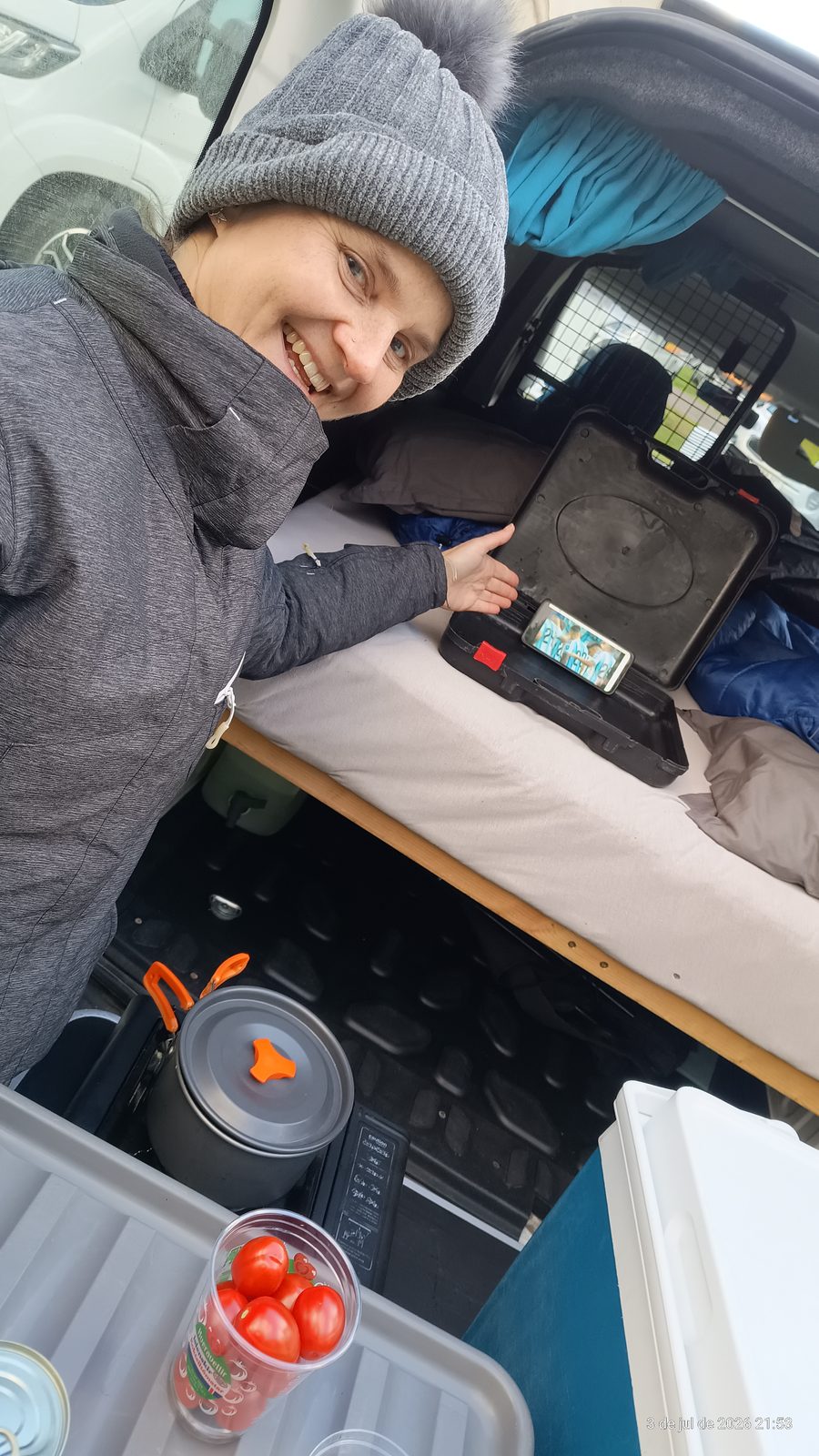 Cooking on the portable stove inside the Fiat Doblo camper in Húsavík