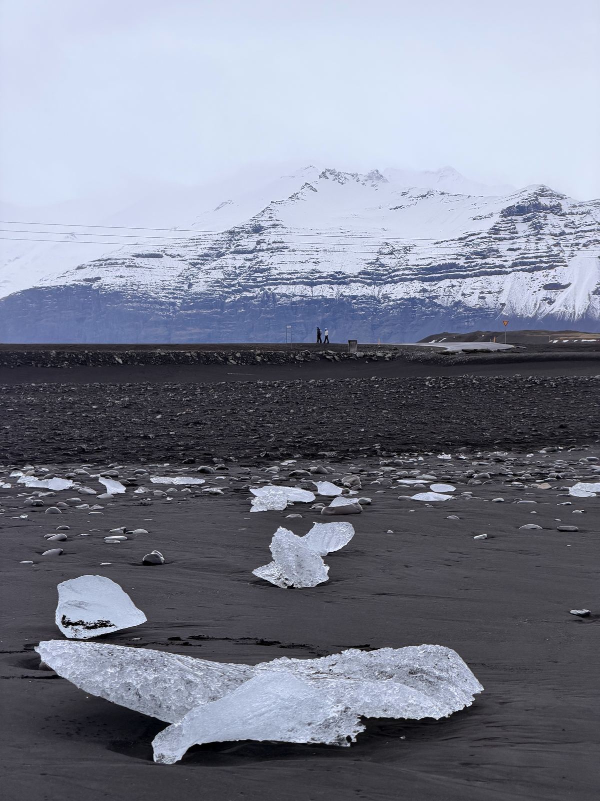 Chunks of glacier ice washed up on the black sand of Diamond Beach