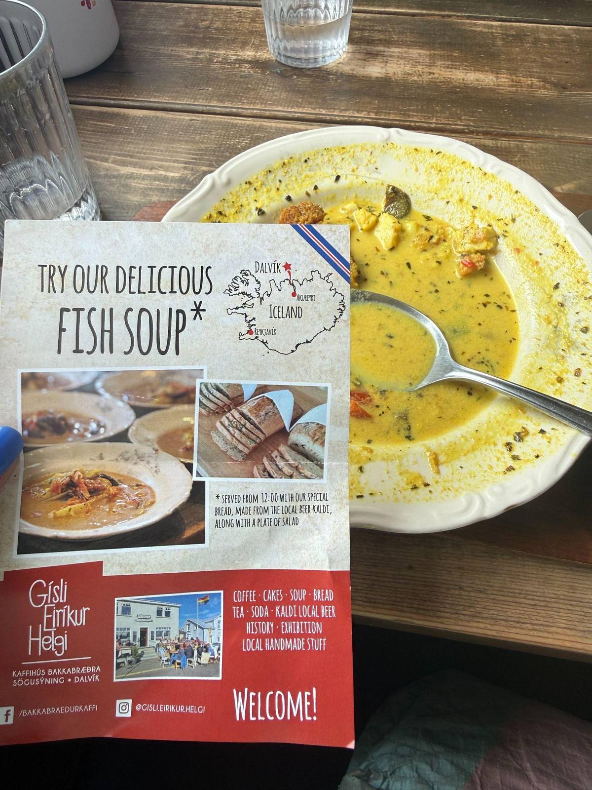 Bowl of fish soup with the menu at Gísli Eiríkur Helgi café in Dalvík