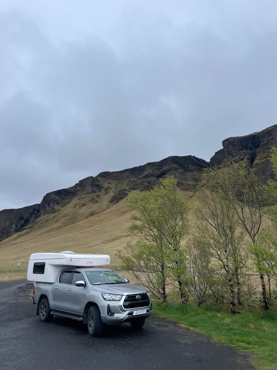 Toyota Hilux camper parked at the campsite in Kirkjubæjarklaustur, South Iceland