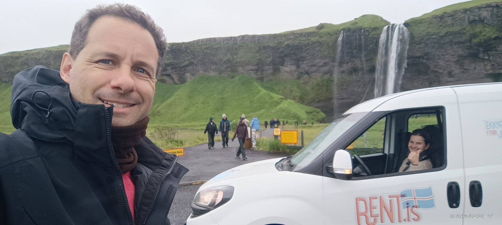 Selfie with the Rent.is Fiat Doblo camper parked near Seljalandsfoss waterfall
